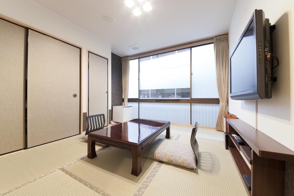 Kikunoya Hotel Hatsukaichi Quarto foto